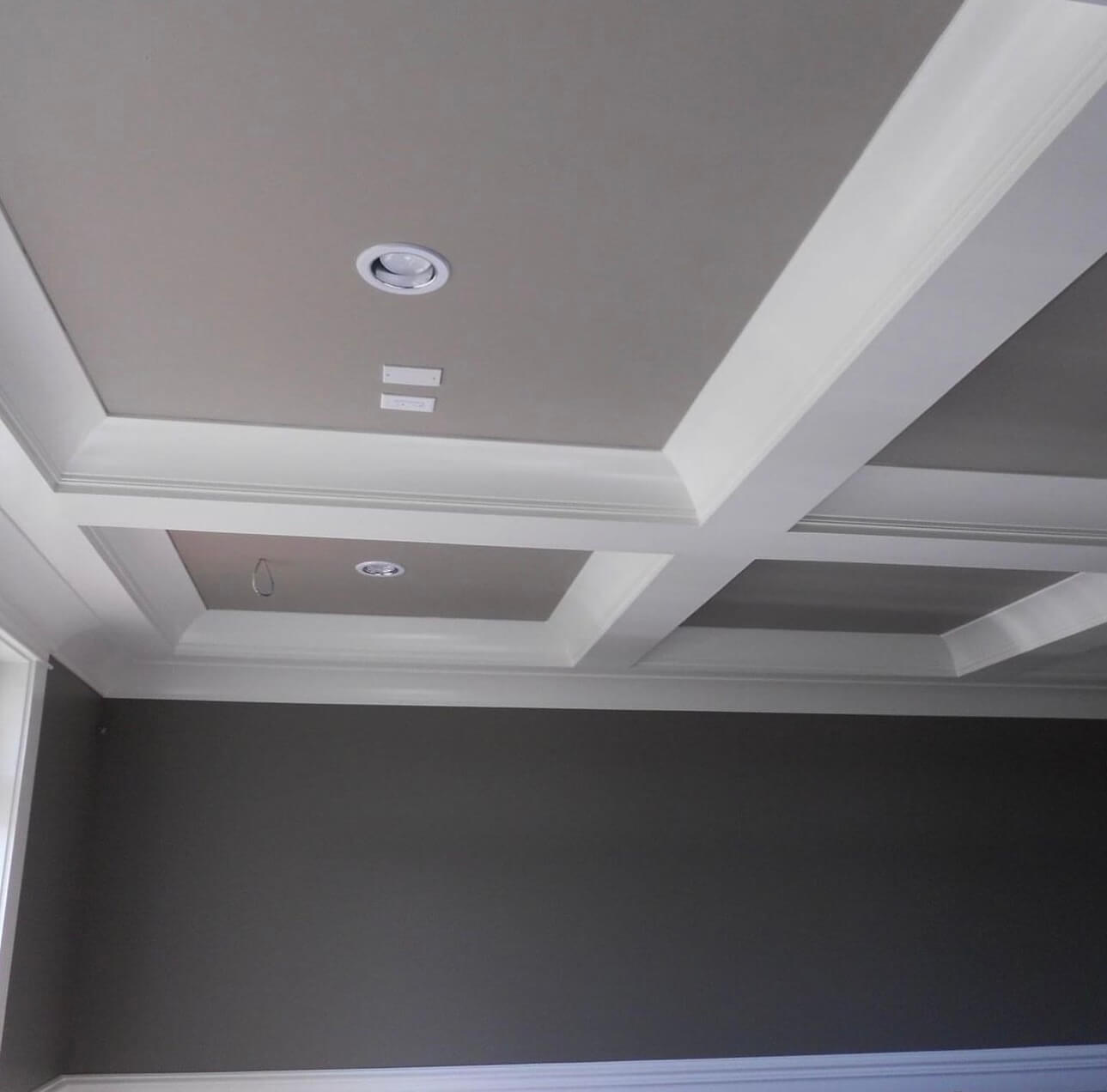 Grey wall accent and white ceiling freshly painted for a home interior Oakville, Ontario